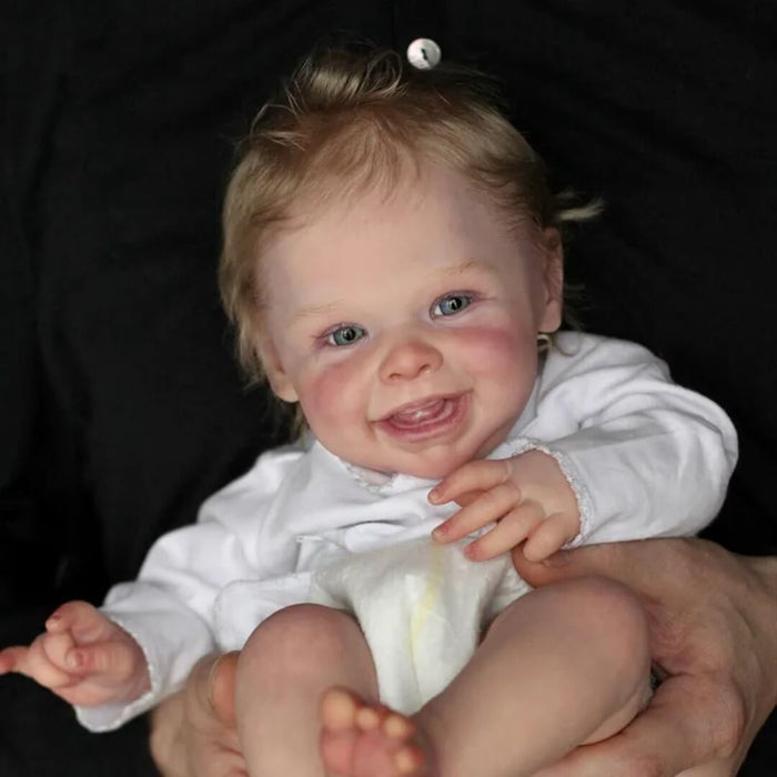 Bebê Reborn Bianca 50cm, boneca realista com corpo macio, olhos vivos, cabelo fio a fio e acessórios. Perfeita para crianças 3+, traz magia às brincadeiras!