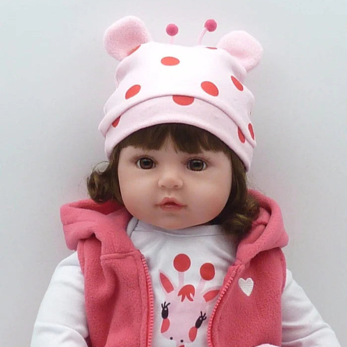 Bebê Reborn 48cm, boneca realista de silicone com olhos marrons, roupa, chupeta, garrafa e pelúcia. Perfeita para crianças 3+, estimula imaginação e afeto!