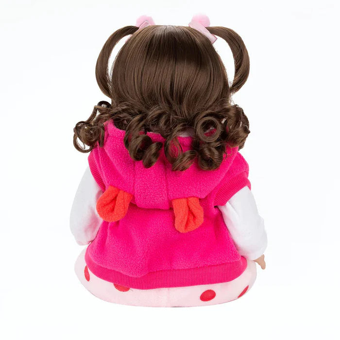 Bebê Reborn 48cm, boneca realista de silicone com olhos marrons, roupa, chupeta, garrafa e pelúcia. Perfeita para crianças 3+, estimula imaginação e afeto!