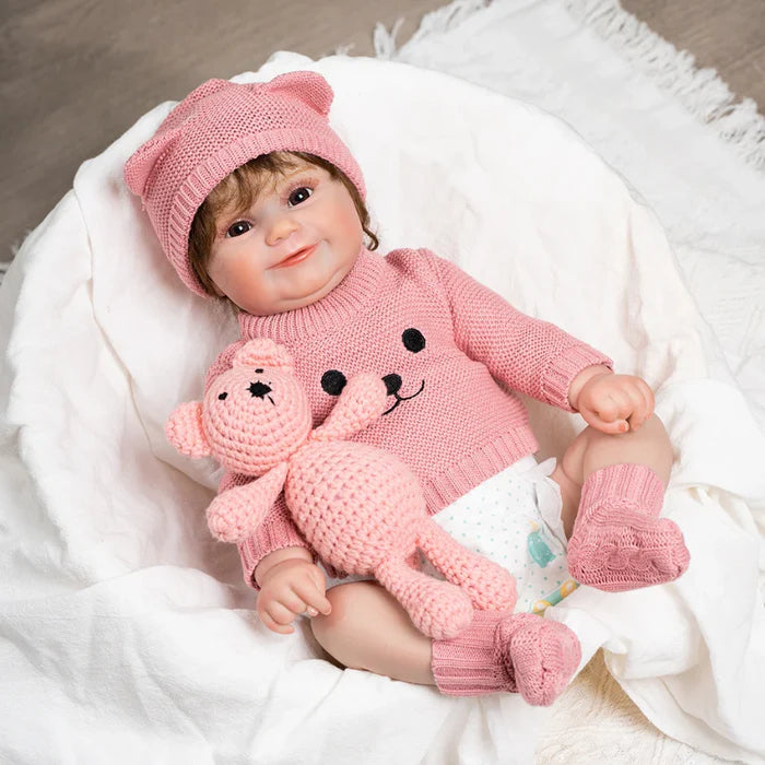 Bebê Reborn Melissa 45cm, boneca realista de silicone com olhos vivos, cabelo enraizado e acessórios. Perfeita para crianças 3+, traz ternura e magia às brincadeiras!