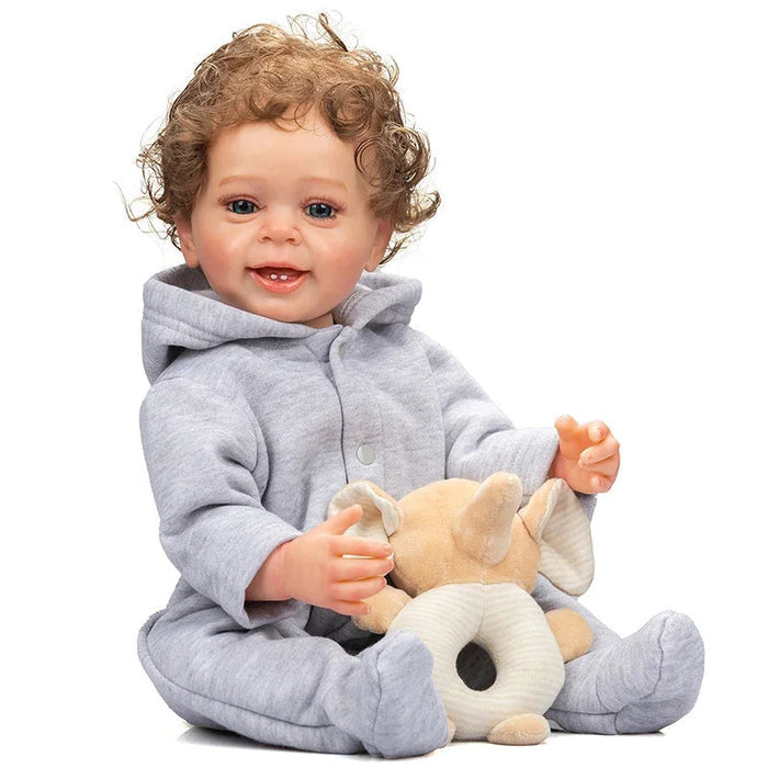 Bebê Reborn Pedro Henrique 55cm, boneco realista de silicone com olhos fixos, cabelo enraizado e acessórios. Perfeito para crianças 3+, fomenta cuidado e imaginação!