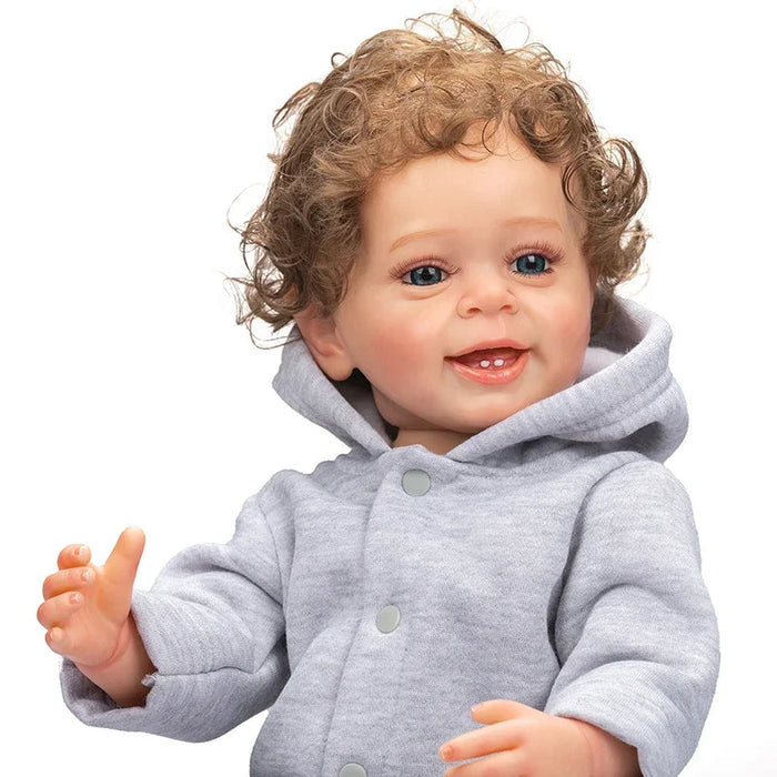 Bebê Reborn Pedro Henrique 55cm, boneco realista de silicone com olhos fixos, cabelo enraizado e acessórios. Perfeito para crianças 3+, fomenta cuidado e imaginação!