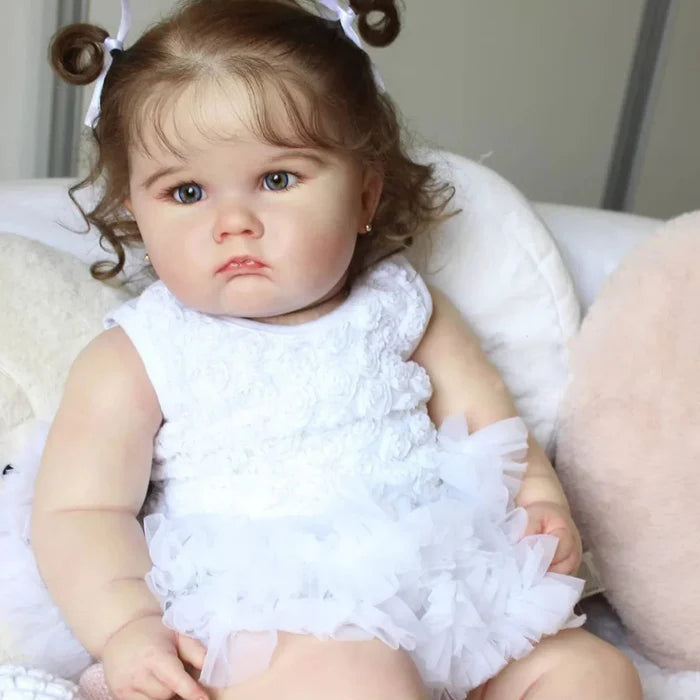 Bebê Reborn Aninha 60cm, boneca realista em silicone macio com olhos acrílicos, aroma de bebê e acessórios. Ideal para crianças 3+, promove brincadeiras mágicas!