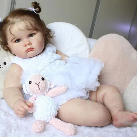Bebê Reborn Aninha 60cm, boneca realista em silicone macio com olhos acrílicos, aroma de bebê e acessórios. Ideal para crianças 3+, promove brincadeiras mágicas!
