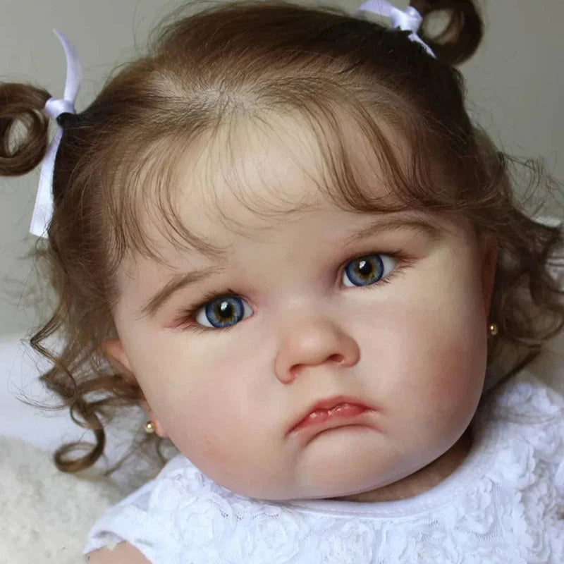 Bebê Reborn Aninha 60cm, boneca realista em silicone macio com olhos acrílicos, aroma de bebê e acessórios. Ideal para crianças 3+, promove brincadeiras mágicas!
