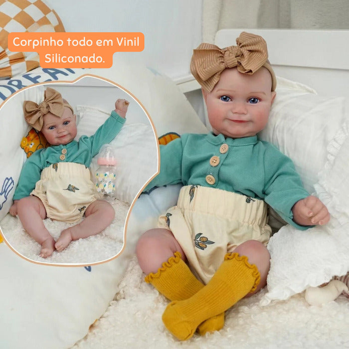 Bebê Reborn Tainá 48cm, boneca realista de silicone com olhos fixos, cabelo pintado e acessórios. Perfeita para crianças 3+, fomenta cuidado e imaginação!