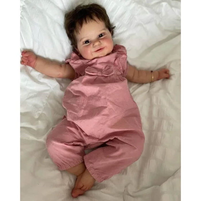 Bebê Reborn Estela 51cm, boneca realista com corpo macio, olhos vivos, cabelo fio a fio e acessórios. Perfeita para crianças 3+, traz magia às brincadeiras!
