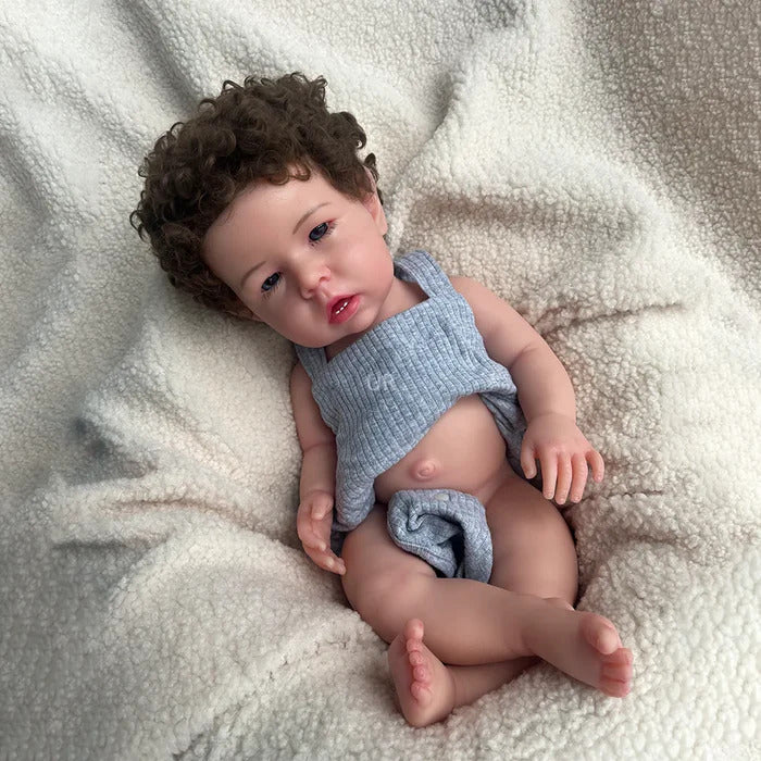 Bebê Reborn Gael, boneca realista de silicone sólido com olhos abertos, membros móveis e acessórios. Perfeita para crianças 3+, traz ternura e magia às brincadeiras!