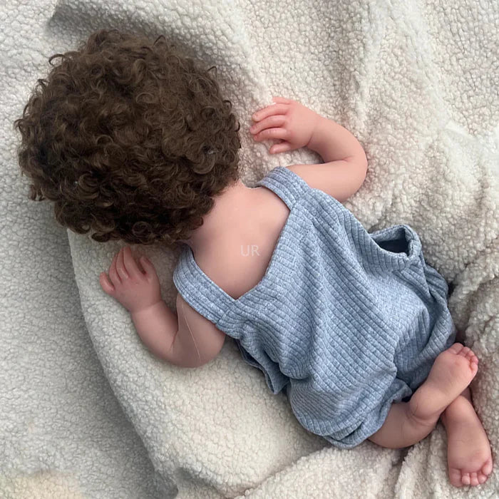 Bebê Reborn Gael, boneca realista de silicone sólido com olhos abertos, membros móveis e acessórios. Perfeita para crianças 3+, traz ternura e magia às brincadeiras!