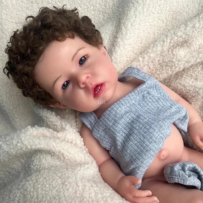 Bebê Reborn Gael, boneca realista de silicone sólido com olhos abertos, membros móveis e acessórios. Perfeita para crianças 3+, traz ternura e magia às brincadeiras!