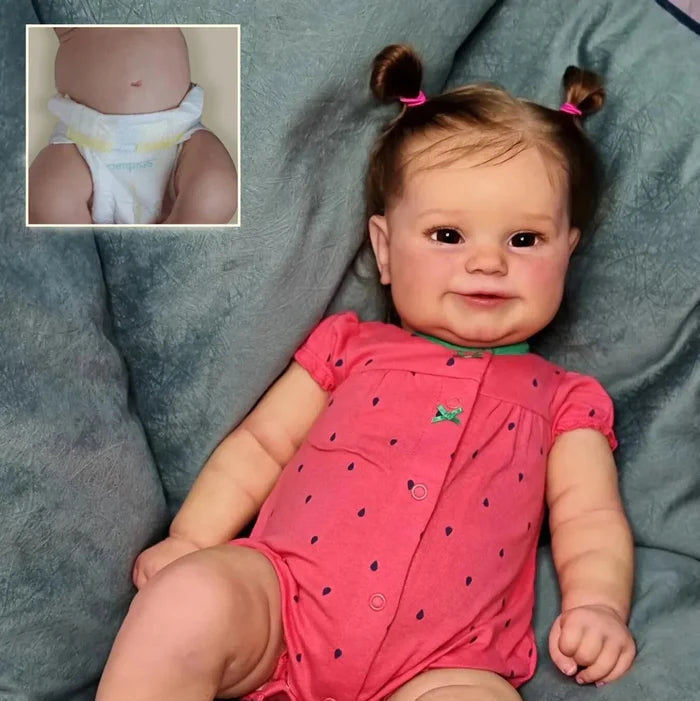 Bebê Reborn Jéssica 50cm, boneca realista de vinil com olhos vivos, cabelo fio a fio e acessórios. Perfeita para crianças 3+, traz magia e ternura às brincadeiras!