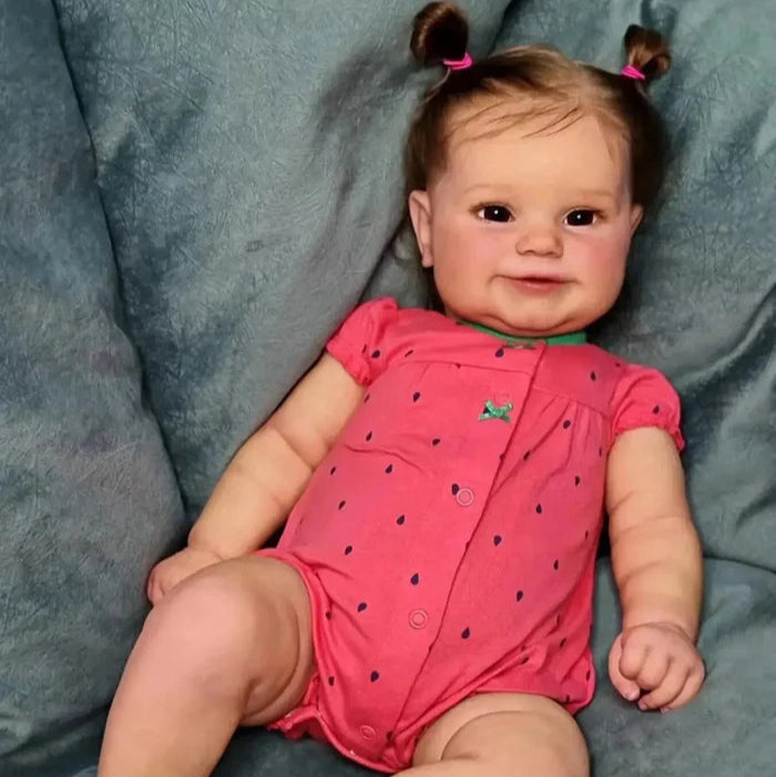 Bebê Reborn Jéssica 50cm, boneca realista de vinil com olhos vivos, cabelo fio a fio e acessórios. Perfeita para crianças 3+, traz magia e ternura às brincadeiras!