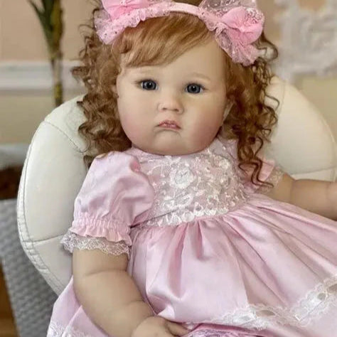 Bebê Reborn Malu, boneca realista de 1,4kg com corpo macio, olhos abertos, cabelo enraizado e acessórios. Perfeita para crianças 3+, traz ternura e magia!