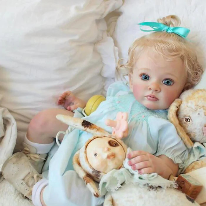 Bebê Reborn Maria 55cm, boneca realista com corpo macio, olhos vivos, cabelo fio a fio e acessórios. Perfeita para crianças 3+, traz magia e ternura às brincadeiras!