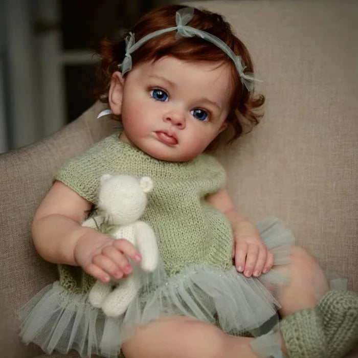 Bebê Reborn Rebeca 55cm, boneca realista com corpo macio, olhos vivos, cabelo fio a fio e acessórios. Perfeita para crianças 3+, traz magia e carinho às brincadeiras!