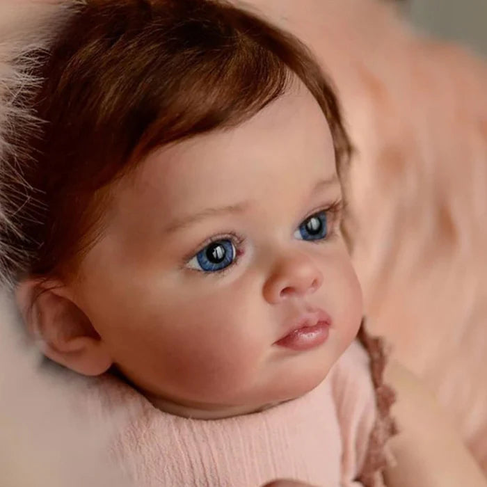 Bebê Reborn Rebeca 55cm, boneca realista com corpo macio, olhos vivos, cabelo fio a fio e acessórios. Perfeita para crianças 3+, traz magia e carinho às brincadeiras!