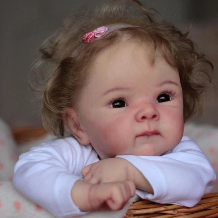 Bebê Reborn Valentina 55cm, boneca realista com corpo macio, olhos vivos, cabelo fio a fio e acessórios. Perfeita para crianças 3+, traz magia às brincadeiras!