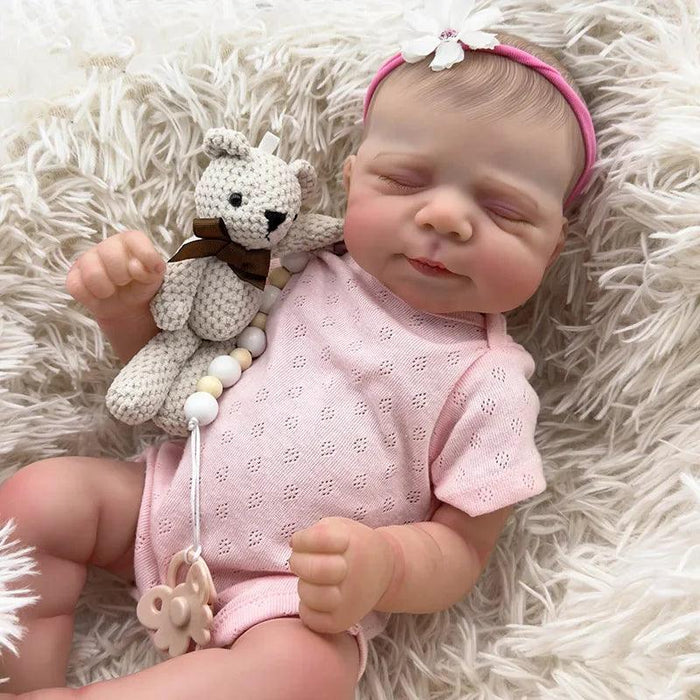 Bebê Reborn Cecília 48cm, boneca artesanal de silicone com olhos fechados, cabelo pintado e acessórios. Perfeita para crianças 3+ e colecionadores, ideal para banho!