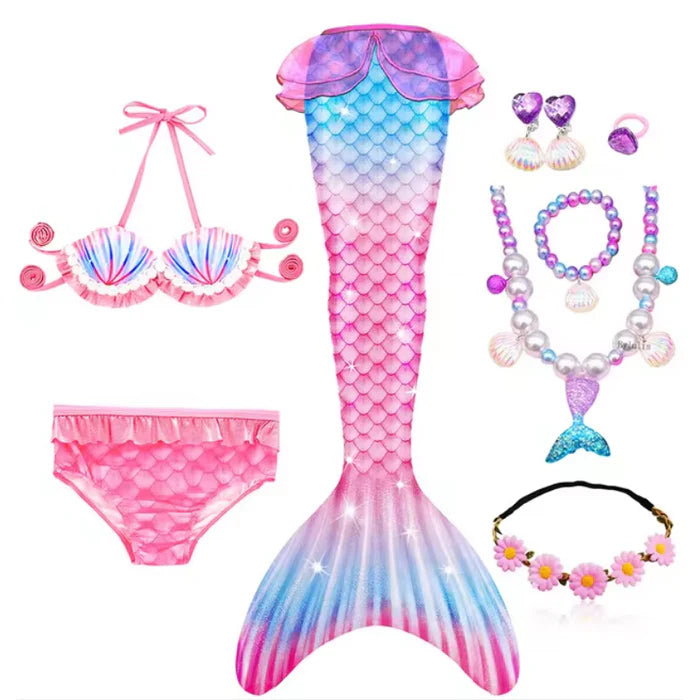 Fantasia Infantil Cauda de Sereia, biquíni, tiara de flores e acessórios. Perfeita para crianças, combina magia e estilo em brincadeiras encantadas e festas!