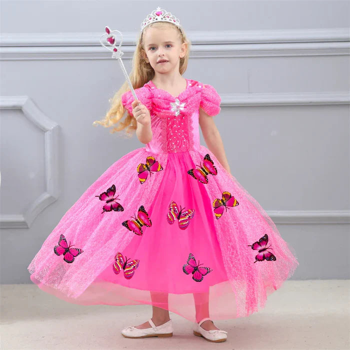 Fantasia Infantil Cinderela Rosa com vestido, coroa, varinha, luvas e colar, em poliéster, algodão e voil. Perfeita para crianças, combina magia e elegância em festas!