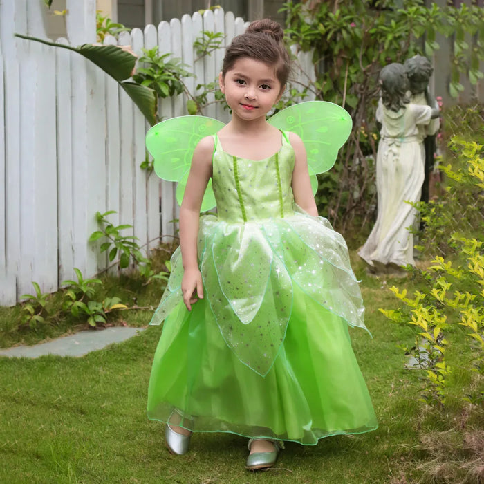 Fantasia Infantil Fada Tinker Bell com vestido, asa, luva, coroa, colar e brinco, em poliéster e viscose. Perfeita para crianças, combina magia e conforto em aventuras!