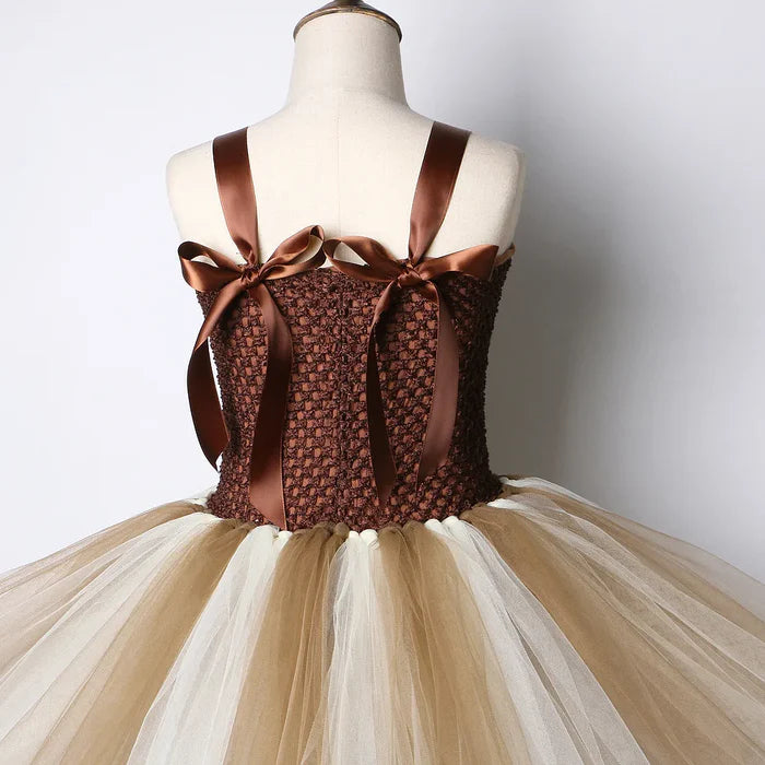 Fantasia Infantil Girafinha Magia, em poliéster e nylon. Perfeita para crianças, combina magia e conforto em brincadeiras encantadas e festas temáticas adoráveis!
