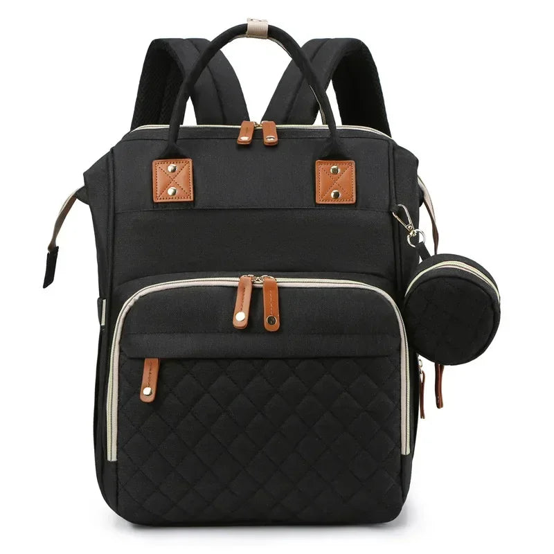 Mochila maternidade 3 em 1 com berço dobrável, compartimento térmico e espaço amplo para os cuidados com o bebê.