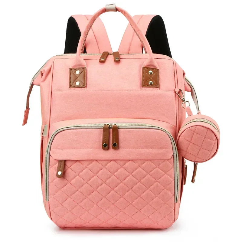 Mochila maternidade 3 em 1 com berço dobrável, compartimento térmico e espaço amplo para os cuidados com o bebê.