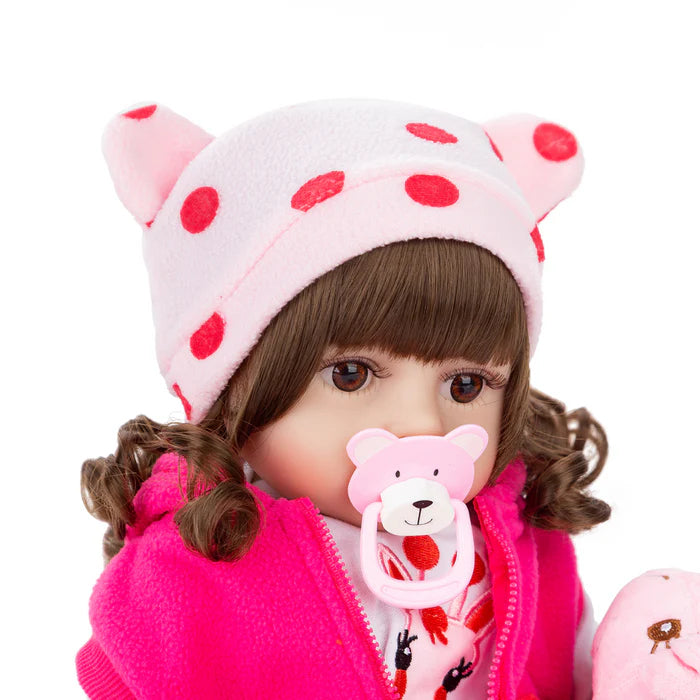 Bebê Reborn 48cm, boneca realista de silicone com olhos marrons, roupa, chupeta, garrafa e pelúcia. Perfeita para crianças 3+, estimula imaginação e afeto!