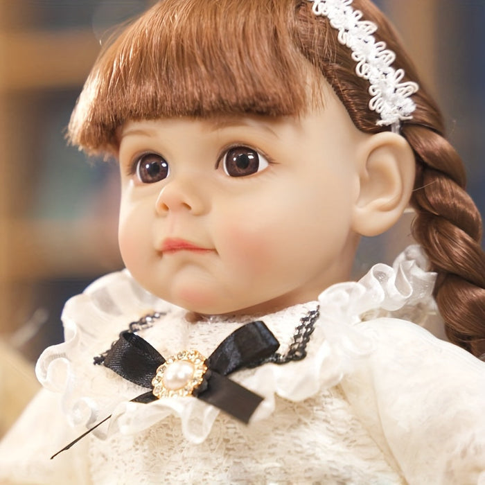 Bebê Reborn Lavínia 35cm, boneca realista de silicone macio com traços delicados. Perfeita para crianças 3+ e colecionadores, combina segurança, carinho e qualidade!