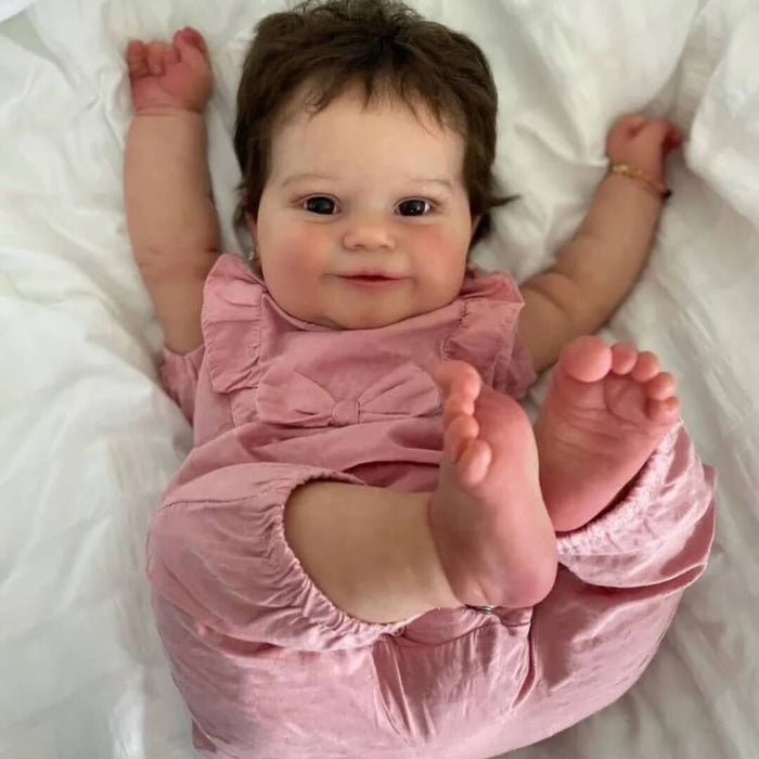 Bebê Reborn Estela 51cm, boneca realista com corpo macio, olhos vivos, cabelo fio a fio e acessórios. Perfeita para crianças 3+, traz magia às brincadeiras!