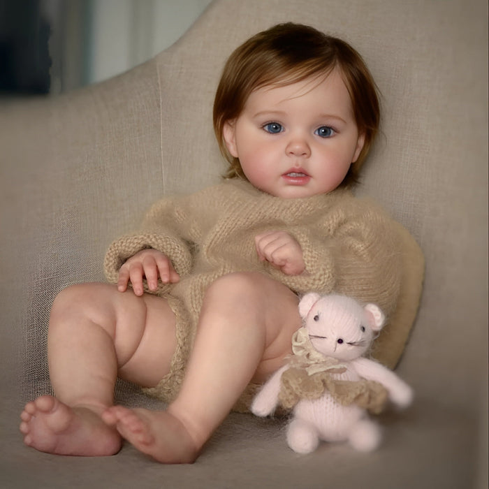 Bebê Reborn Heloísa 55cm, boneca realista com corpo macio, olhos vivos, cabelo fio a fio e acessórios. Perfeita para crianças 3+, traz magia e ternura às brincadeiras!