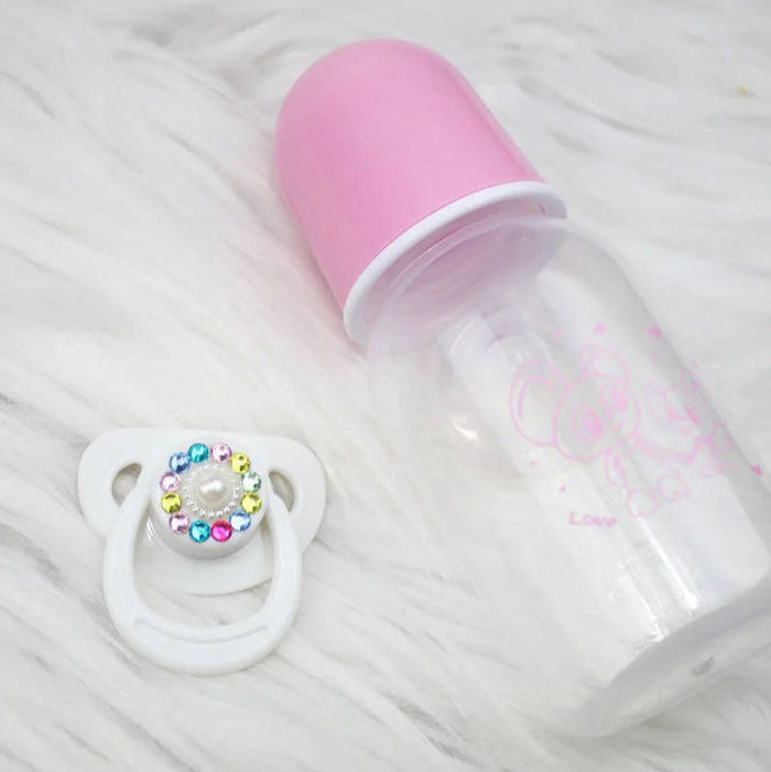 Conjunto Magnético Chupeta e Mamadeira Reborn, 5cm, rosa e branco, plástico ABS seguro. Design encantador para bonecas, 14+, adiciona realismo e carinho à brincadeira!