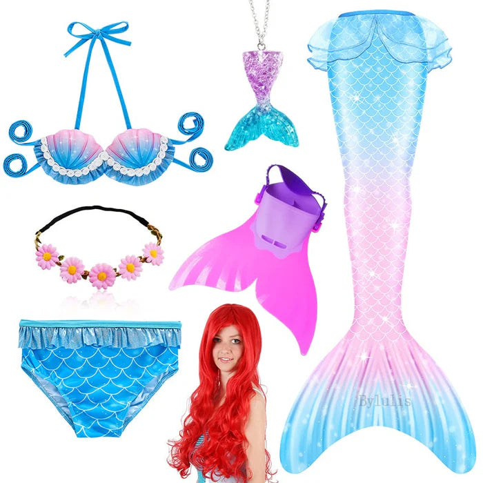 Fantasia Infantil Ariel Pequena Sereia com cauda, biquíni, tiara, nadadeira, colar e cabelo. Perfeita para crianças, combina magia e conforto em aventuras subaquáticas!
