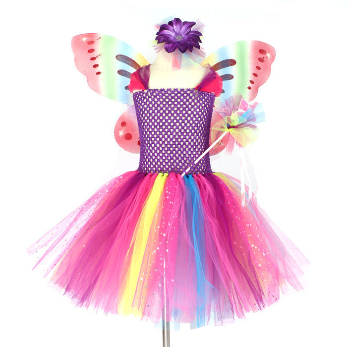 Fantasia Infantil Fada Encantada das Cores com vestido, acessório de cabelo, varinha, asas e bolsinha, em elastano, tule, voil e nylon. Ideal para crianças, mágica e confortável!